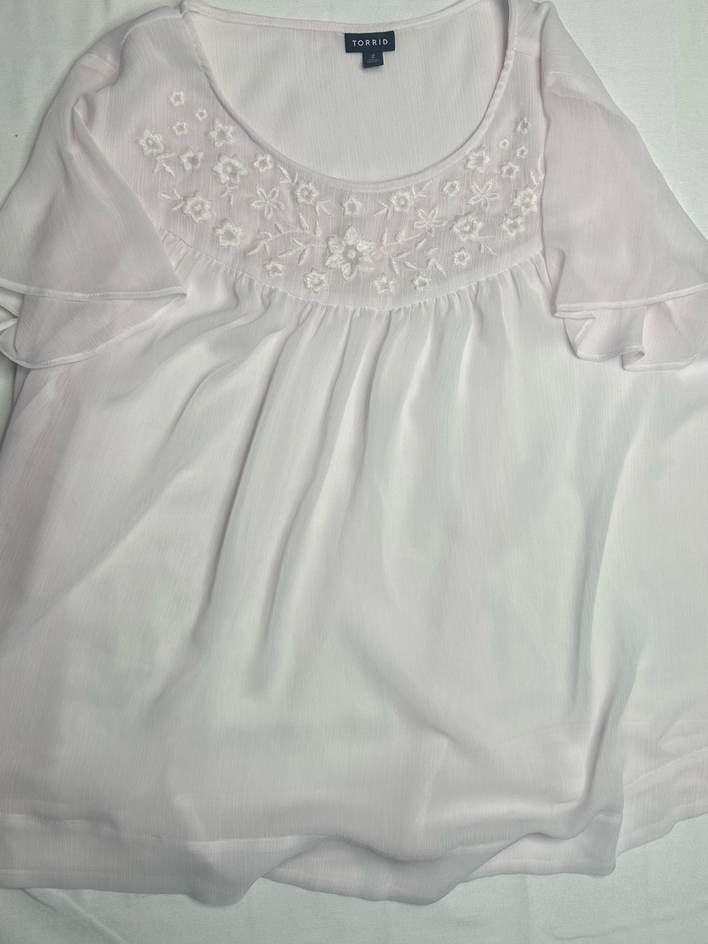 Torrid white/very light pink chiffon blouse. Size 2 (18/20) floral embroidered